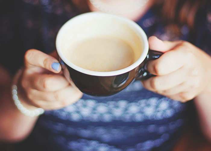woman-enjoying-morning-cup-of-coffee