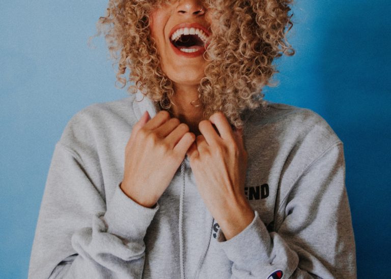 Screaming blonde curly messy